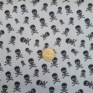 Skulls on Grey Quilting cotton