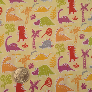 Dinosaurs on Yellow Quilting Cotton