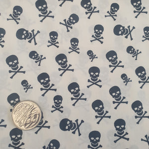 Skulls on white Quilting Cotton